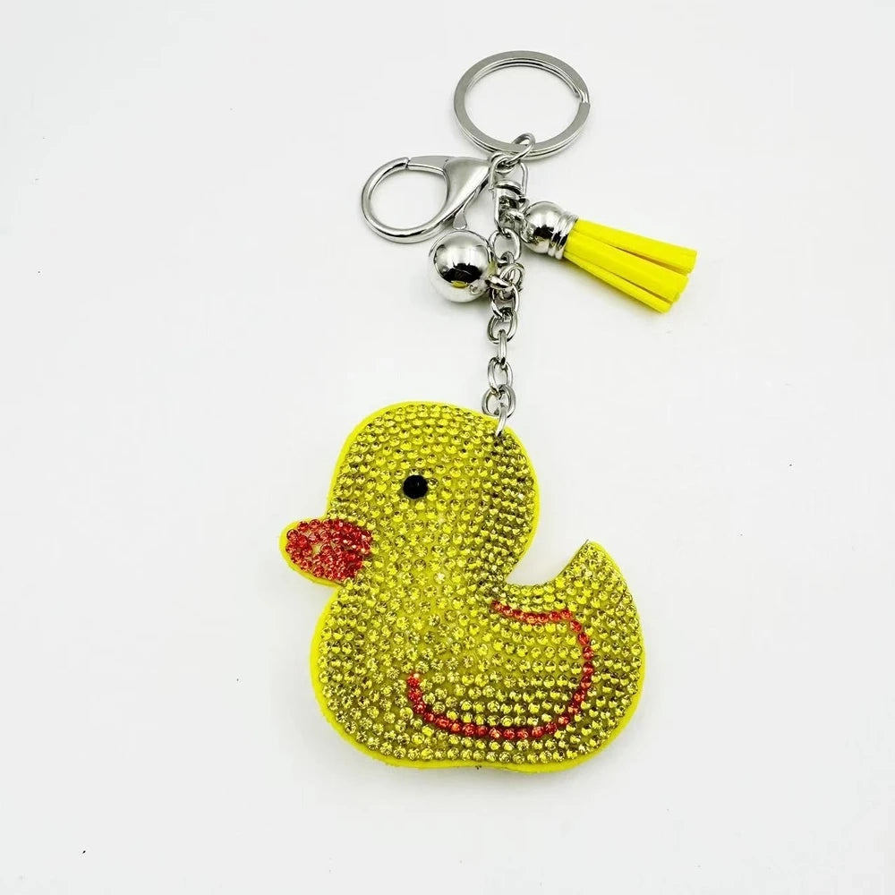 Bright yellow duck rhinestone fancy bead charms with silver keychain hardware, tassels, and bell accents - 1